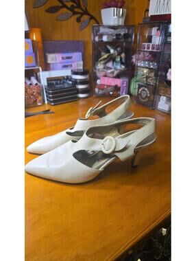 Yves Saint Laurent Paris Ivory Leather Slingback Pumps